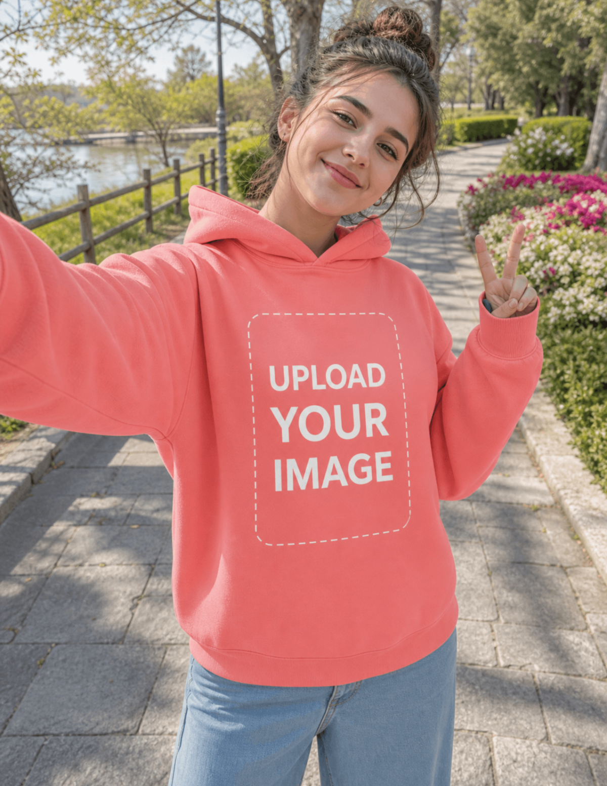 Free Person Taking a Selfie in a Pullover Hoodie Mockup Template to Edit Online