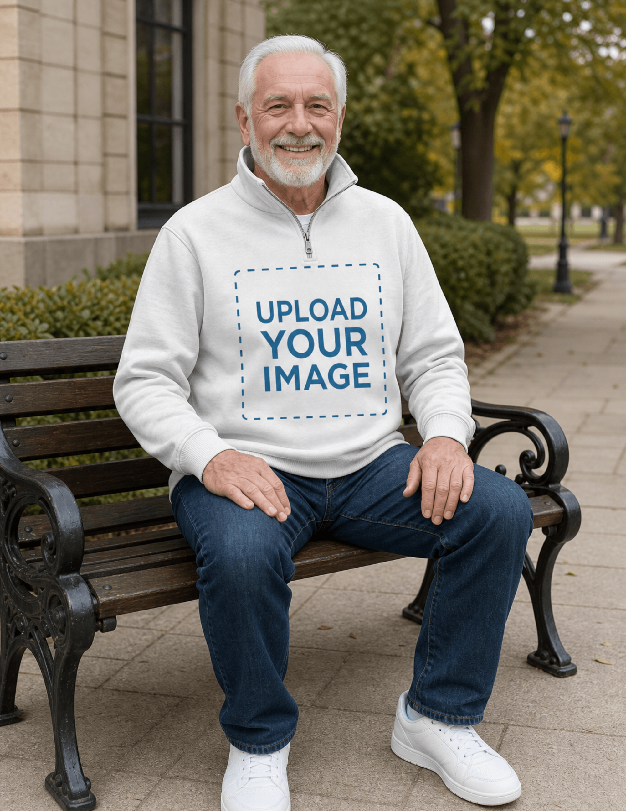 Free Happy Elder Man Sitting on a Chair with Half Zip Hoodie Mockup Template to Edit Online