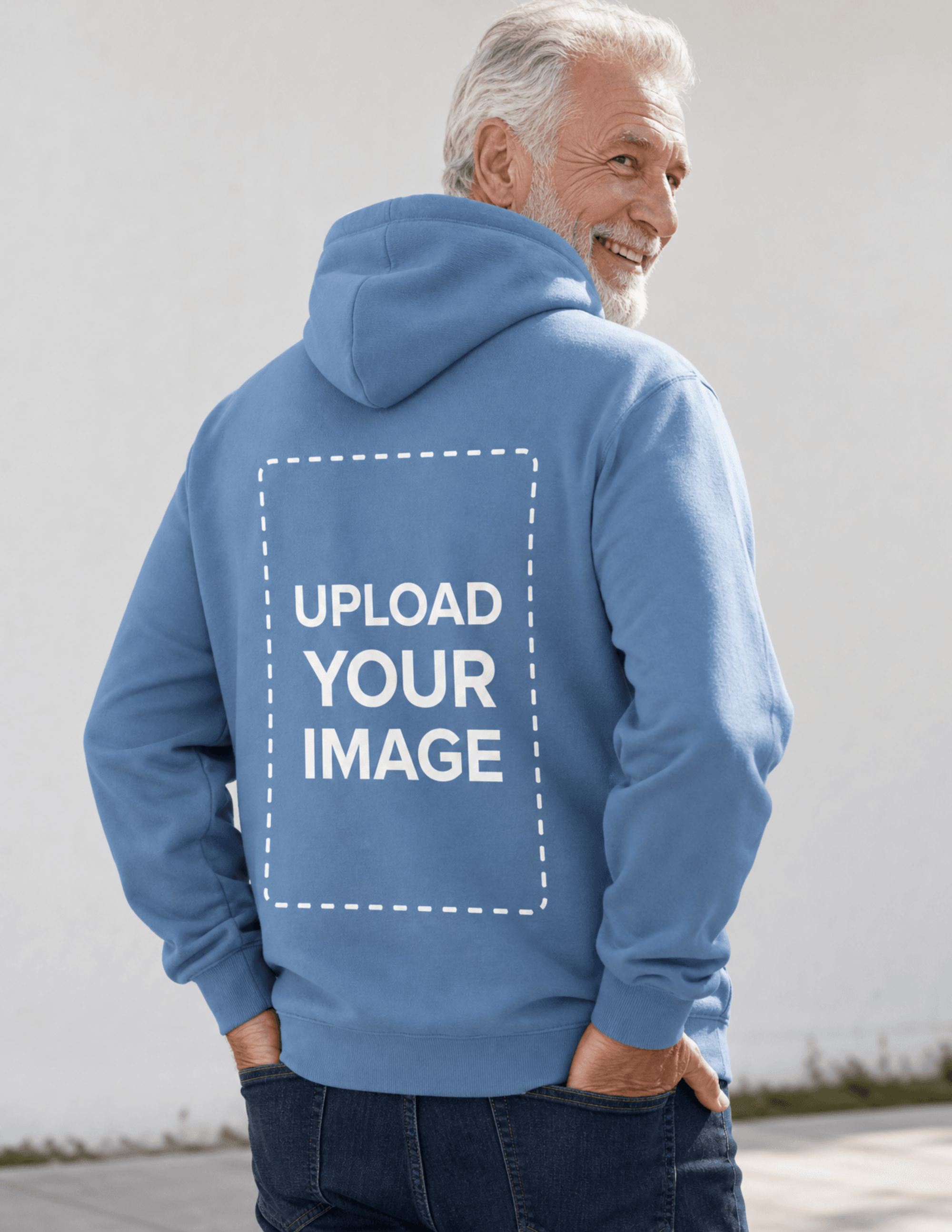 Free Senior Muscular Man in Photo Studio Wearing Hoodie Mockup Template to Edit Online