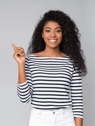 Free Woman Pointing Upward Photo to Edit Online