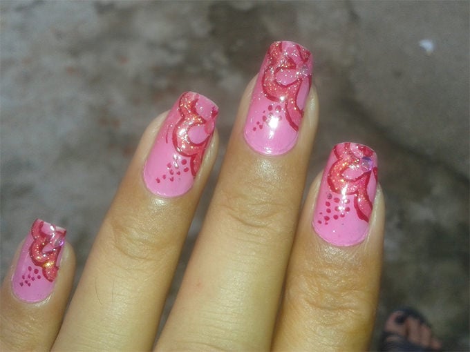 pink nail art with flowers