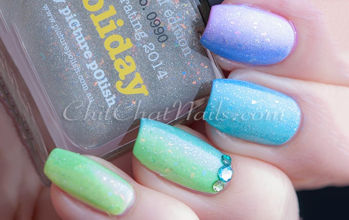 blue and green glitter nail design