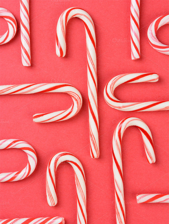candy canes on red background