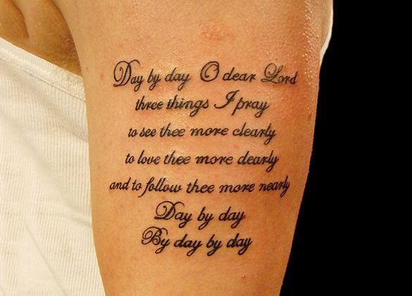 awesome lettering tattoo on biceps