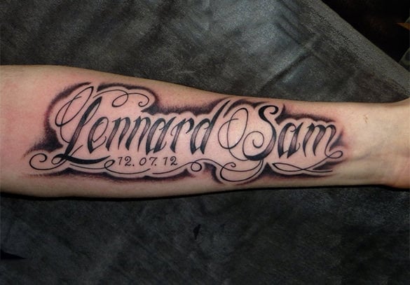 memorable lettering tattoo on arm
