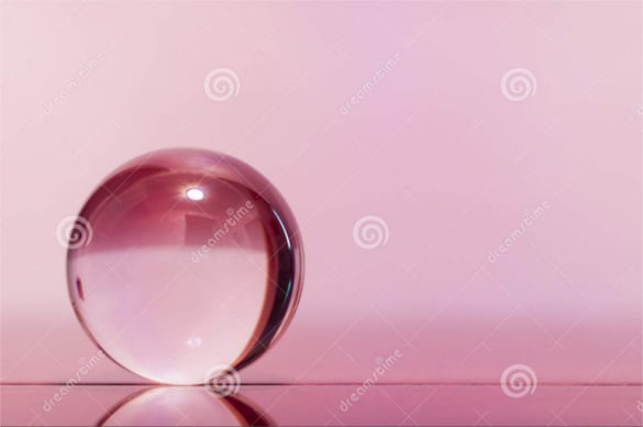 glass transparent ball on light pink background download