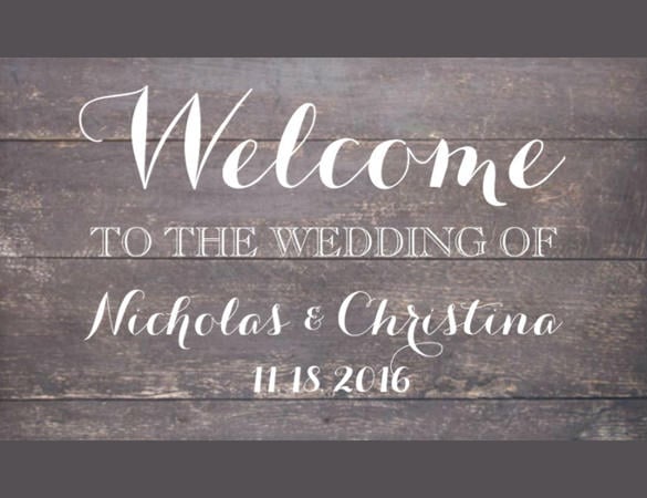 welcome wedding banner on rustic vintage wood