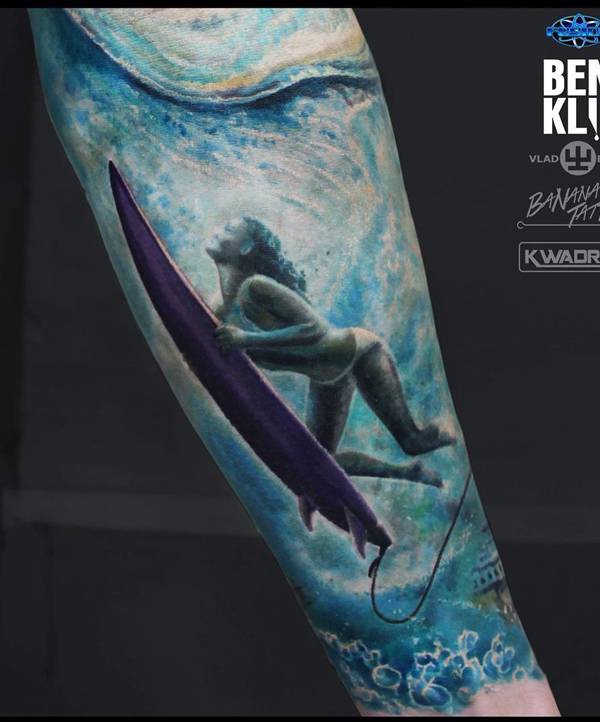 duck diving surf girl tattoo