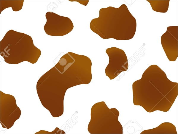 brown and white spot cow pattern