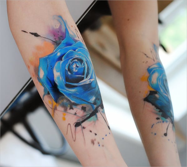 blue watercolor rose tattoo