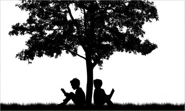 silhouette of two people on a tree