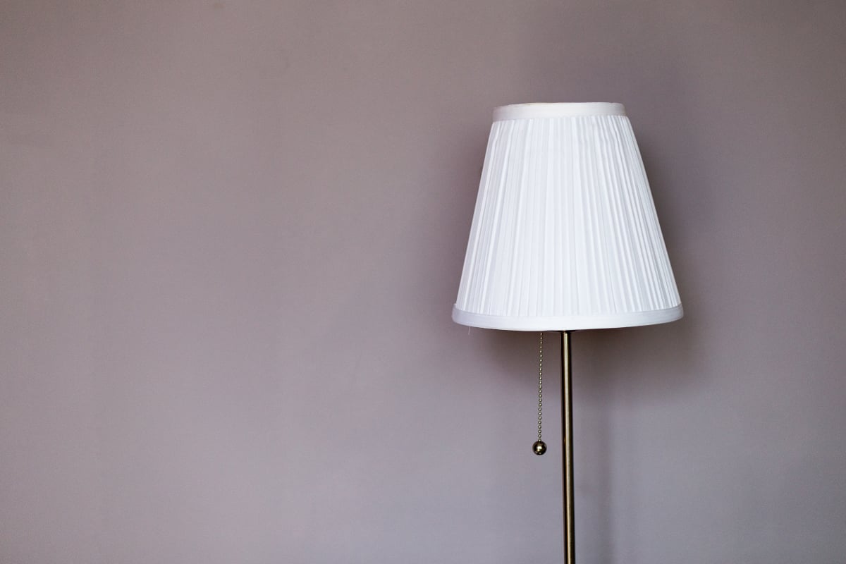 white and gray metal lamp