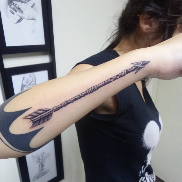 girl direction arrow tattoo
