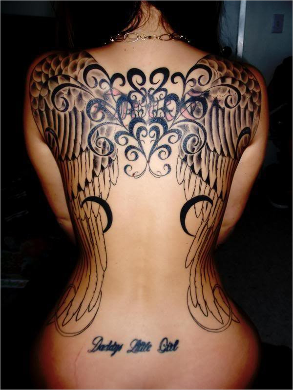 geometric angel wings tattoo