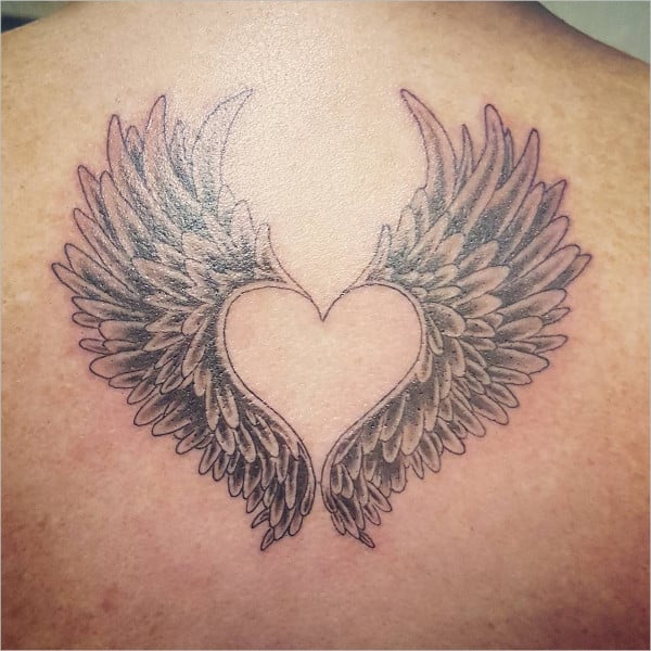 heart with anglewings tattoo