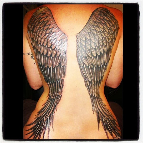 long angle wings tattoo
