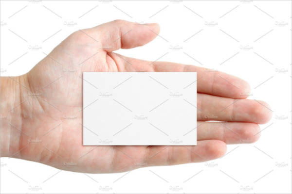 Blank business card in hand