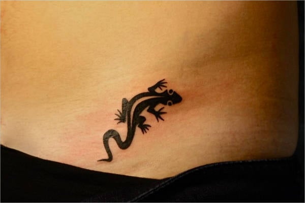 geometric designed lizard tattoo