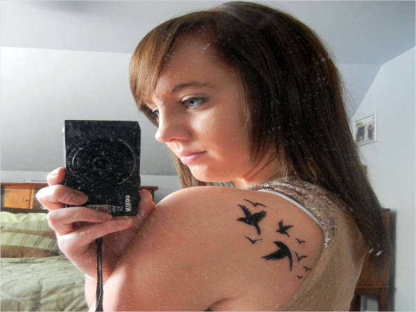 small bird tattoo