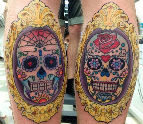 sugar skull tattoo on thigh