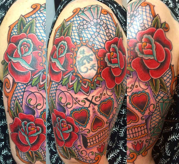 skull tattoo design with roses