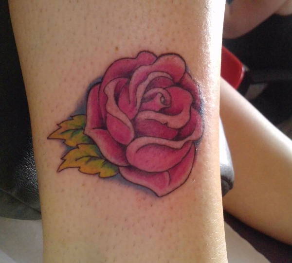traditional little rose tattoo