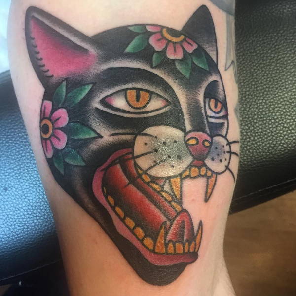 traditional floral cat tattoo