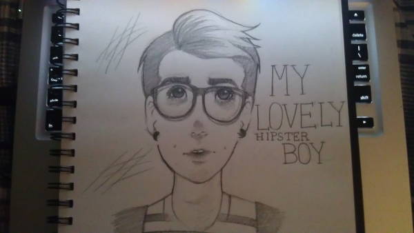 lovely hipster boy drawing