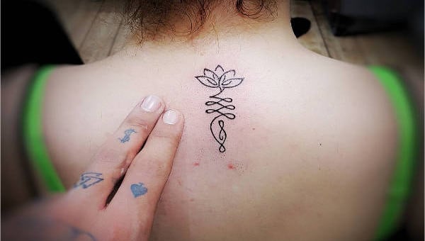 Simple and sweet 🌸🌿 | Spine tattoos, Body art tattoos, Tattoos