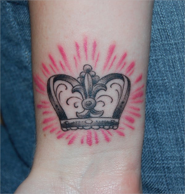 crown tattoo on wrist