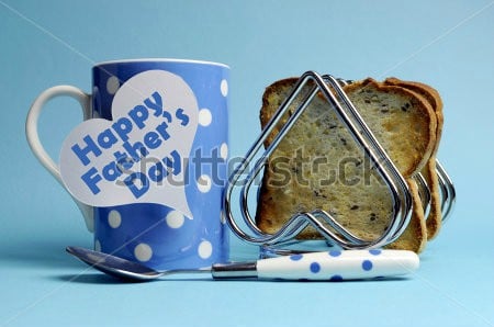 stock photo happy father s day breakfast message on white heart tag with polka dot coffee mug and heart rack