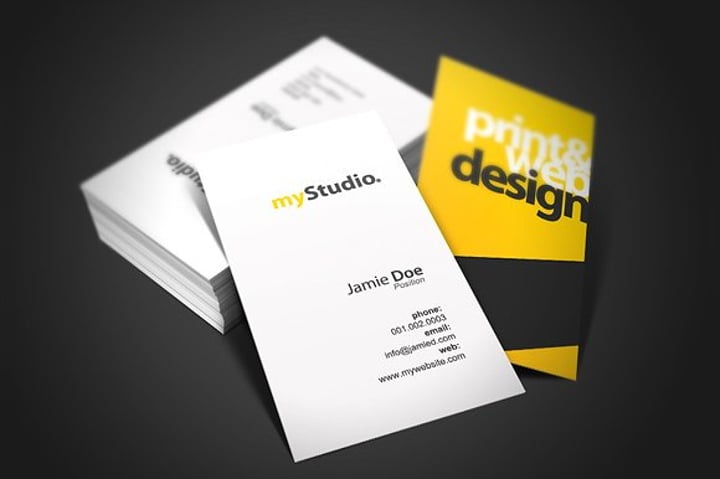 black and yellow studio business card